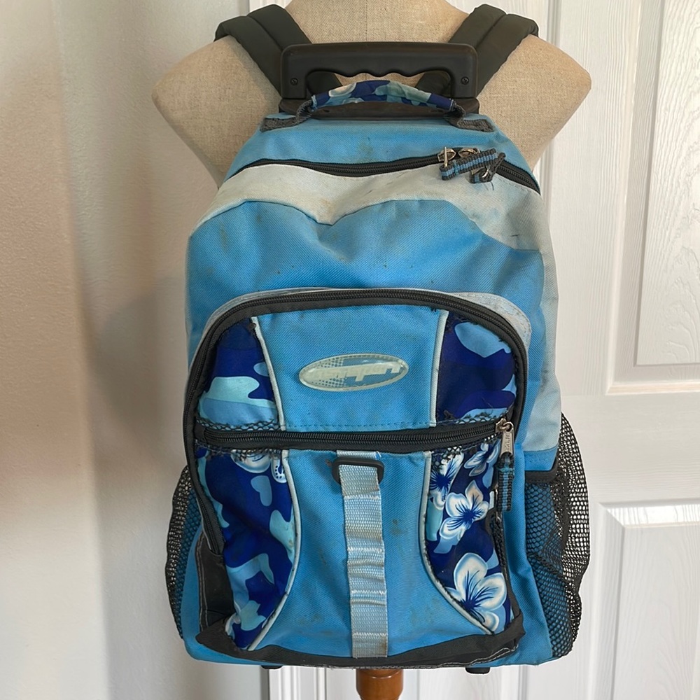 Rolling backpack blue tropical